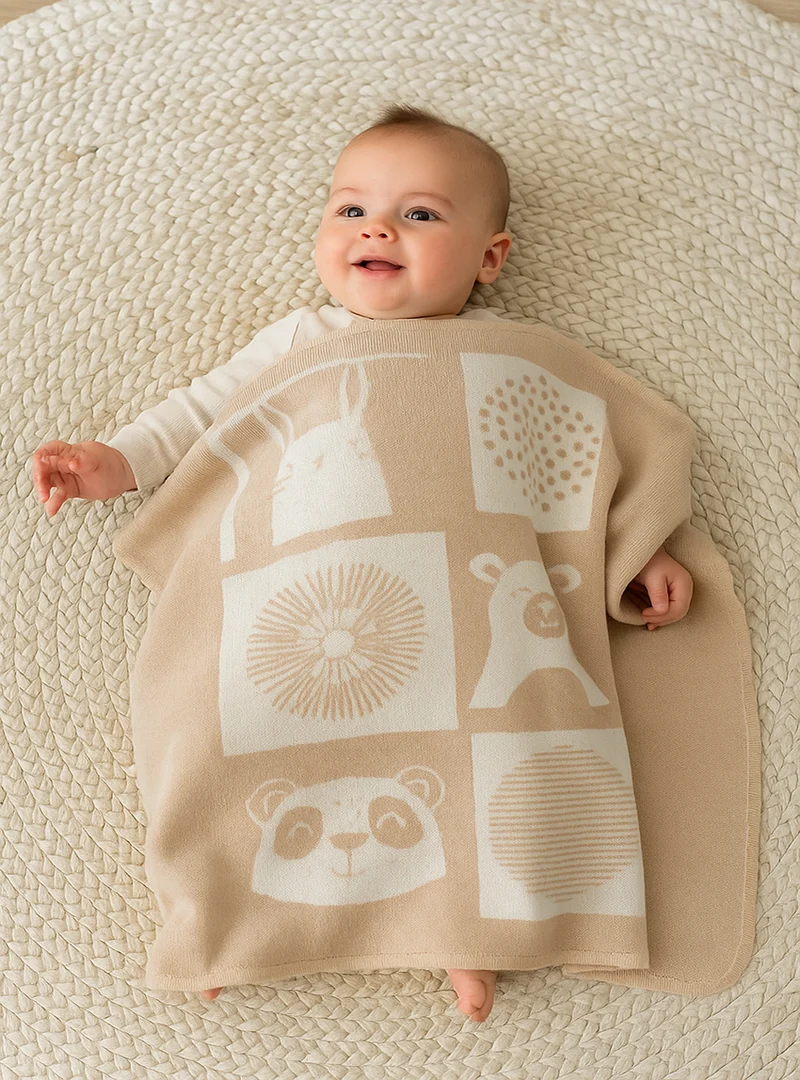 Couverture bébé laine mérinos motif animaux beige pastel